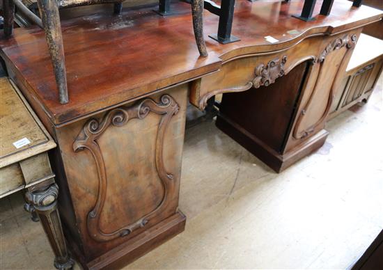 Mid Victorian mahogany serpentine fronted pedestal sideboard (lacking superstructure)